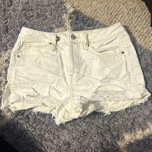 RSQ size 25, high rise white shorts
